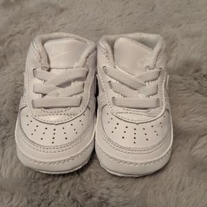 Baby white Nikes size 1